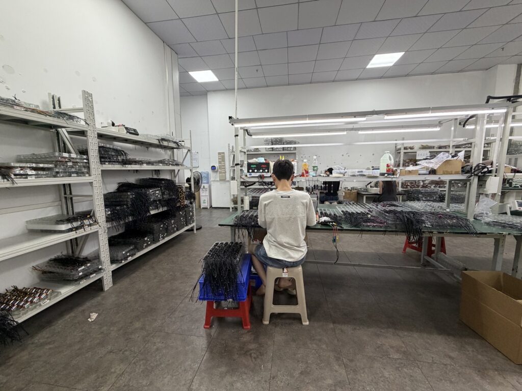 Yadovex motor assembly line workstations with wiring and components